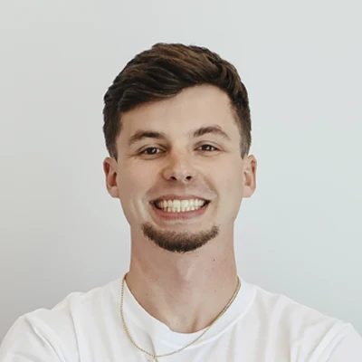 A headshot of Harrison Christian, a staff member at Pinnacle Spine and Sport.