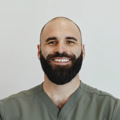 A headshot of Dr. Cody Elenz , a chiropractor at Pinnacle Spine and Sport.